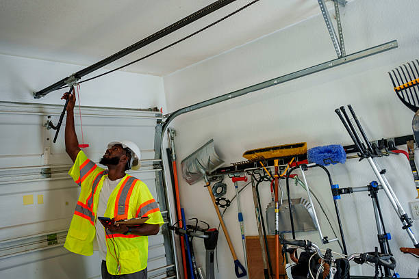 Professional Garage Door Panel Replacement technician working in Clayton, MO